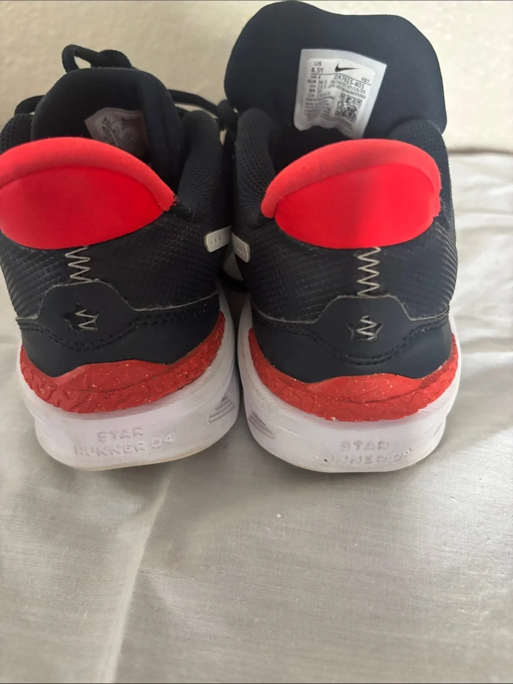 Nike Boys Sneakers in Black with White Swoosh and Red Accent